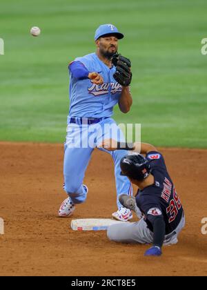 Oakland Athletics shortstop Aledmys Diaz (12) throws to first as Cleveland  Guardians' Steven Kwan (38) slides into second on a double play hit into by  Jose Ramirez during the third inning of