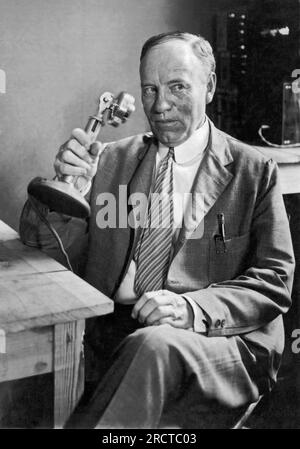 Dayton, Tennessee:  July, 1925. Judge John Raulston, presiding at the trial of The State of Tennessee v. John Scopes ('The Monkey Trial)', at the radiophone. It was the first trial in the United States to be broadcast over the radio. Stock Photo