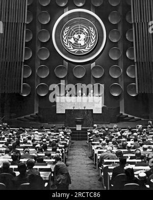 New York, New York:  September 20, 1955 Opening meeting of the 10th regular session of the United Nations General Assembly with Secretary-General Dag Hammarskjold on the rostrum at the far left. Stock Photo