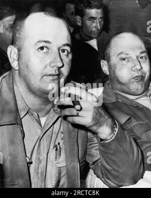 Meridian, Mississippi:  December 4, 1964 Neshoba County Sheriff Lawrence Rainey (right) and his deputy Cecil Price wait to post bond after they were arraigned today in connection with the slaying of civil rights workers James Earl Chaney, Andrew Goodman, and Michael Schwerner last June in Philadelphia, Misissippi. Stock Photo