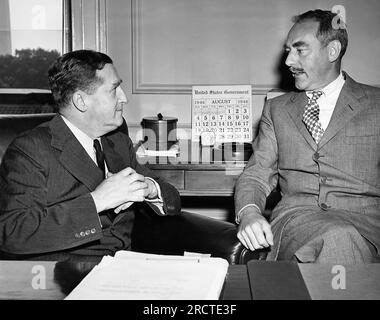Washington, D.C.:  August 22, 1946 United Nations ambassador, Herschel Johnson, left, talks with Secretary of State Dean Acheson about the 48 hour ultimatum given Marshal Tito of Yugoslavia. Stock Photo
