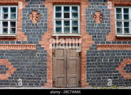 The old Fiskars Mill from 1898 in Fiskars Village, founded in the 17th century, western Uusimaa region in southern Finland Stock Photo