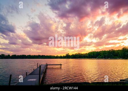 Spectacular sunset over Wing Lake in Bloomfield Township in Michigan Stock Photo