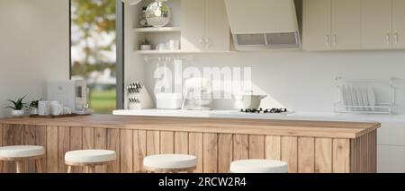 Interior design of a modern minimalist white kitchen with a wooden kitchen countertop, white kitchen appliances, white stools, and decor. 3d render, 3 Stock Photo