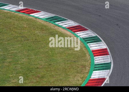 colored curbs on track Stock Photo