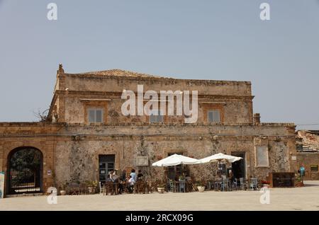 The former Palazzo di Villadorata in the fishing village of Marzamemi, Syracuse, southeastern Sicily, Italy Stock Photo