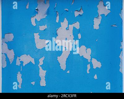 peeling blue paint on the wall Stock Photo