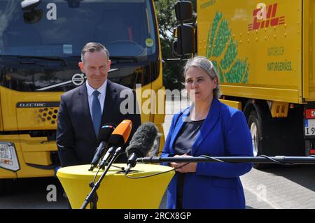 Berlin, Germany. 13th July, 2023. Deutsche Post DHL has purchased 13 large electric trucks for transporting parcels between distribution centres. In this photo taken on July 13, 2023, Federal Minister of Transport Volker Wissing and Nikola Hagleitner of DHL present the cars to journalists. Credit: Zapotocky Ales/CTK Photo/Alamy Live News Stock Photo