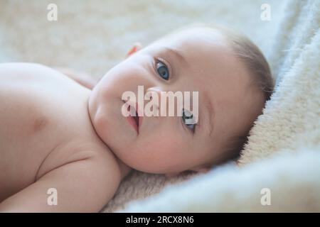 Little baby girl relax at home. Stock Photo