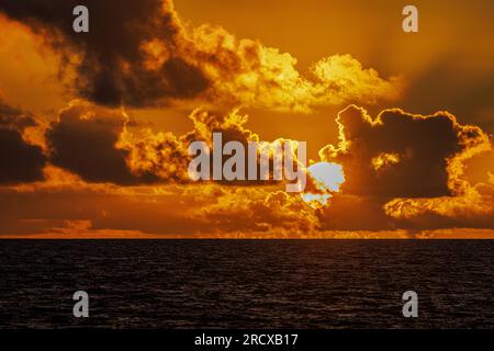 Sunset with Cumulus Clouds over the Pacific Ocean, USA, Hawaii, Maui, Kihei Stock Photo