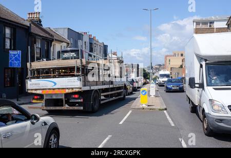 Brighton UK 17th July 2023 - Traffic congestion in Brighton due to streets still closed around The Royal Albion Hotel after the major fire over the weekend  : Credit Simon Dack / Alamy Live News Stock Photo