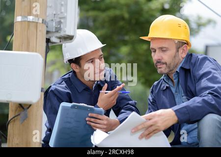 the two civil engineers talking Stock Photo