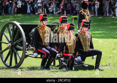 London, UK. 17th July, 2023. The King's Troop Royal Horse Artillery fire a 41 hot Royal Gun Salute for Queen Camilla's birthday in Green Park. They are supported by the Band of the Cold Stream Guards. Credit: Imageplotter/Alamy Live News Stock Photo