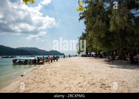Langkawi, Malaysia - Dec 24, 2018: Tourist spend time at a beach in Pulau Beras Basah in Langkawi in sunny day. - People enjoying the beaches in Besar Stock Photo