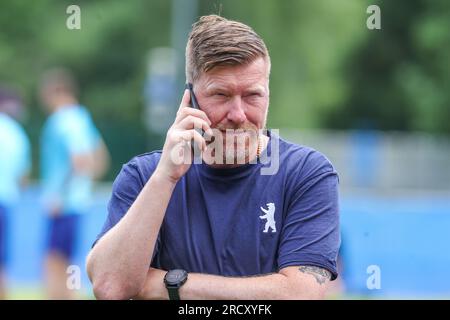 Zell Am See, Austria. 17th July, 2023. Soccer: 2nd Bundesliga, Hertha BSC training camp, Hertha's Andreas Neuendorf talks on his cell phone. Credit: Tim Rehbein/dpa/Alamy Live News Stock Photo