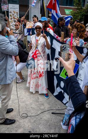 Brussels, Belgium. 17th July, 2023. A group of demonstrators from several Latin American countries hold the protest against proposed trade agreements between the European Union and Latin American countries in front of the EU Council headquarters in Brussels, Belgium on 17/07/2023 . Governments from Latin America, the Caribbean and the European Union are meeting in Brussels for the EU-CELAC summit. Credit: dpa picture alliance/Alamy Live News Stock Photo