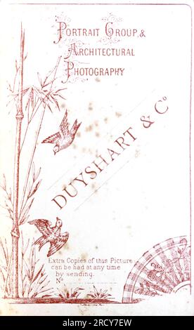 Advertisement on the back of a photograph by Duyshart and Co, of 75 Duke Street, Chelmsford.  From a collection of Victorian carte de visite photographs, dated to the 1890s. Carte de visite is a French term known in English as “visiting card”. They usually had an albumen photographic print of about 54x89mm mounted on a slightly larger card. In some cases, the ravages of time have taken their toll. Stock Photo