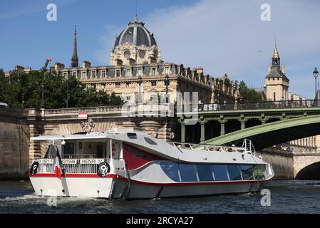 Paris, France. 17th July, 2023. Photo taken on July 17, 2023 shows the parade on the River Seine to test 'maneuvers', 'distances', 'duration' and 'video capture' of the future opening ceremony of the Paris Olympics in 2024. The total fleet is made up of 57 boats for the rehearsal, 39 representing the delegations and 18 others providing support as well as Olympic Broadcasting Services (OBS). Credit: Gao Jing/Xinhua/Alamy Live News Stock Photo