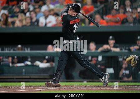 Baltimore Orioles' Adley Rutschman follows through on a swing during the  first inning of a baseball game between the Baltimore Orioles and the  Toronto Blue Jays, Thursday, Aug. 24, 2023, in Baltimore.