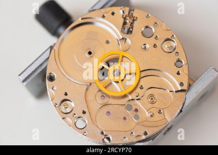 Watch Repair at Watchmaker, Old watch Mechanism Dismantled for Repair Stock Photo