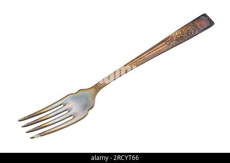 Old oxidized metal fork, cut out, photo stacking Stock Photo