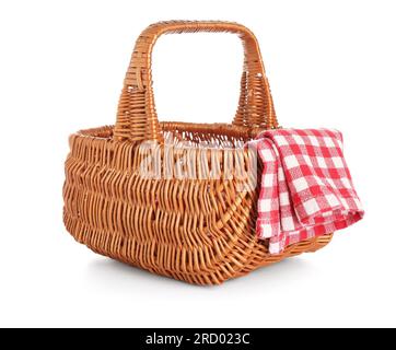 Wicker picnic basket with clean napkin isolated on white background ...