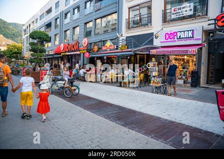 Fethiye, Turkey - June 9, 2023: Street of old town Fethiye with cafes and small shops, Turkey Stock Photo