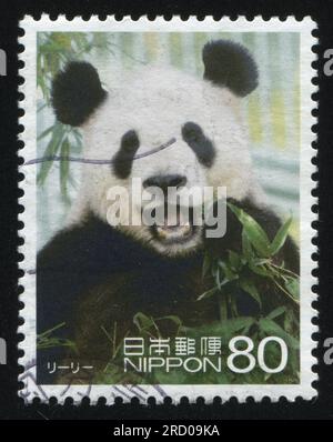 RUSSIA KALININGRAD, 22 APRIL 2016: stamp printed by Japan shows panda, circa 2012 Stock Photo