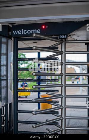 Sterling Heights, Michigan - Turnstiles greet auto workers entering or leaving Stellantis' Sterling Heights Assembly Plant. Stock Photo