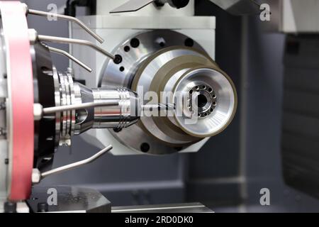 Automated industrial drill sharpening machine close up. Selective focus. Stock Photo