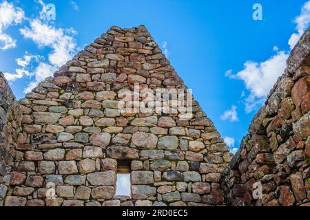 Stone walls of building ruins around Machu Picchu ruins in Peru. Stock Photo