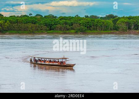 Tourists boat on Madre de Dios River in Peru. Stock Photo