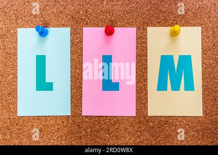 3 letters keyword LLM (Large Language Model), on stickers attached to a cork board. Generative AI chat bot, big data technology, deep learning concept Stock Photo