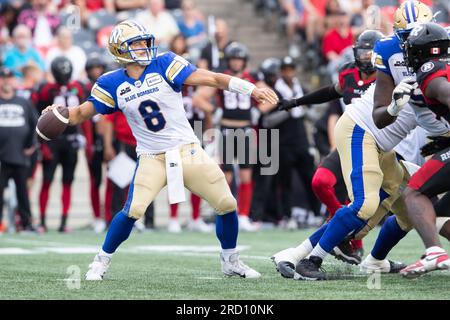 Ottawa, Canada. 15th July, 2023. Winnipeg Blue Bombers quarterback Zach Collaros (8) sets to throw a pass during the CFL game between Winnipeg Blue Bombers and Ottawa Redblacks held at TD Place Stadium in Ottawa, Canada. Daniel Lea/CSM (Credit Image: © Daniel Lea/Cal Sport Media). Credit: csm/Alamy Live News Stock Photo