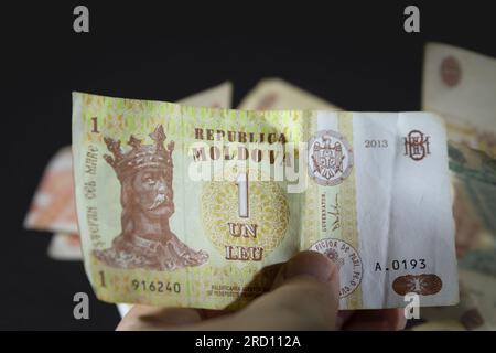 Picture of stacked banknotes of 1 moldovan lei. The leu is the currency of Moldova. Like the Romanian leu, the Moldovan leu is subdivided into 100 ban Stock Photo