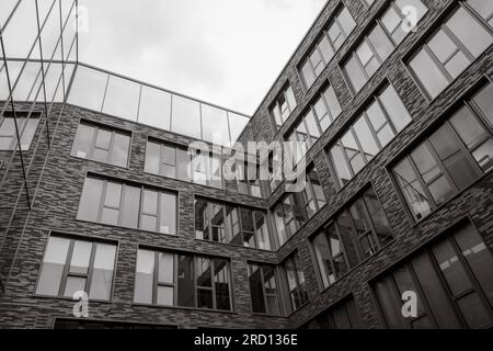 Black and white tone, Exterior architectural detail modern facade of High-rise office buildings. Abstract Urban metropolis background. Stock Photo
