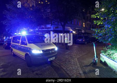 Hamburg, Germany. 17th July, 2023. Emergency forces close a street in a residential area on the edge of the Schanzenviertel. During construction work in Hamburg's Schanzenviertel district, a British aerial bomb from World War II was discovered on Monday. A large contingent of police and firefighters is on the scene. Credit: Bodo Marks/dpa/Alamy Live News Stock Photo