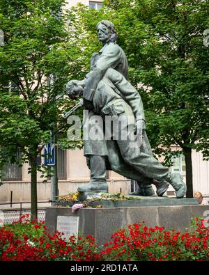 Bratislava, SK – June 10, 2023 The heroic looking Memorial of the Bulgarian Partisans Bronze statue of Bulgarian partisans liberating Bratislava from Stock Photo