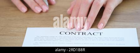 HR manager asks new employee to sign contract. Stock Photo