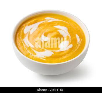 bowl of pumpkin cream soup isolated on white background Stock Photo