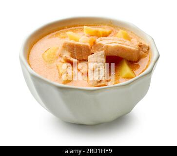 bowl of salmon soup isolated on white background Stock Photo