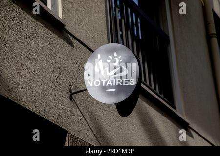 Bordeaux , Aquitaine  France -  07 15 2023 : Notaires french text sign and brand label logo on wall notary office facade in street Stock Photo