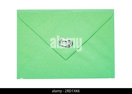 green vintage paper envelope with old metallic soda Can ring pull isolated on the white Stock Photo