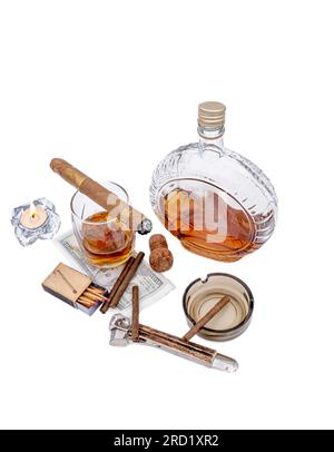 Quality cigars with cognac, cutter, 100 dollar paper, ashtray, light candle and red hot pepper on white background Stock Photo