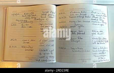 Completed entries in a Filey Bed and Breakfast, hand-written by real guests & customers, North Yorkshire, England, UK, YO14 9LW Stock Photo