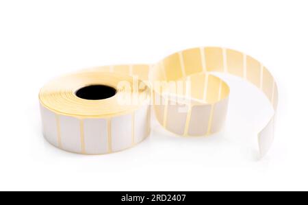 Barcode sticker roll for product price and promo isolated on white background. Blank adhesive empty labels on bobbin. Paper tags for identification Stock Photo