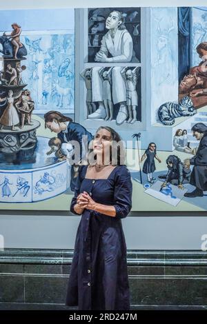 London, UK. 18th July, 2013. A member of staff who posed for artist (by the window) looking at the finished art work of Paula Rego: Crivelli's Garden .National Gallery, London 20 July - 29 October 2023 Credit: Paul Quezada-Neiman/Alamy Live News Stock Photo