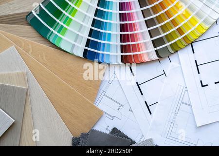 interior design materials and color samples with floor plan blueprint ...