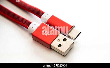Usb and usb type C connectors for smartphone and gadgets closeup in white background. Plug micro cable for mobile devices in macro view Stock Photo
