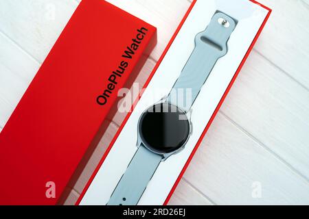 Kharkiv, Ukraine - 12 January 2022: Smart watch Oneplus with red original box. Future modern digital gadget with innovations Stock Photo